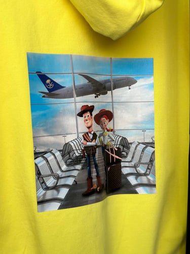 WOODY FLYING WITH SAUDI AIRLINE