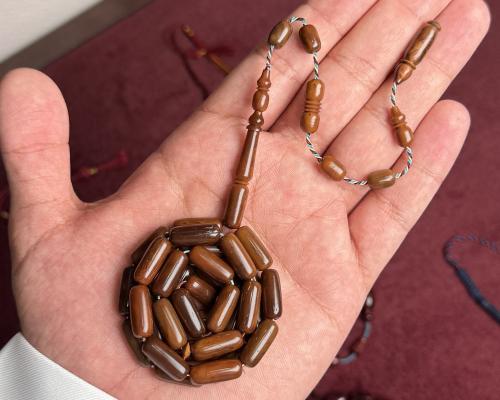 مسباح ثمر الكوك غامق تمليكه