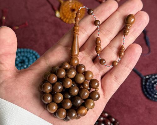 مسباح ثمر الكوك غامق تمليكه