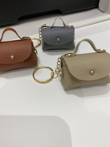 تعليقة شنطة جلد