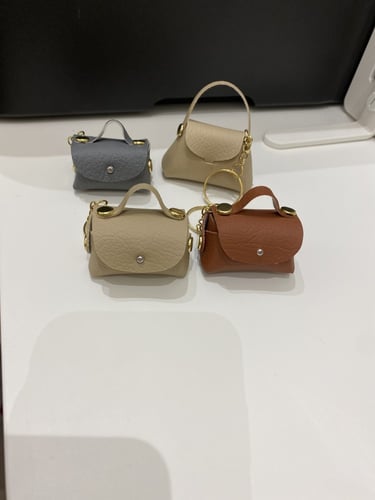 تعليقة شنطة جلد