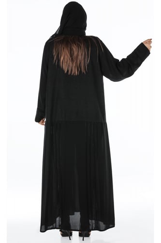 عباية منسوجة من القماش المشجر الناعم وفي الأسفل لم...