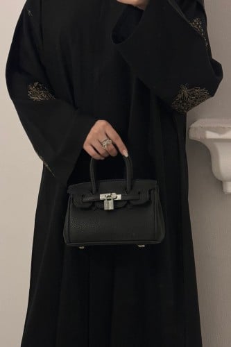 عبايه بتطريز ذهبي نص كلوش طقطق قماش كتان