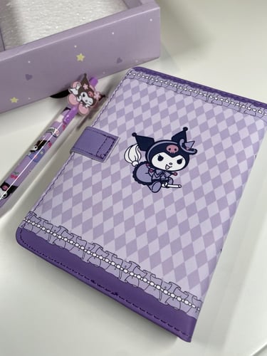 دفتر كرومي مع قلم