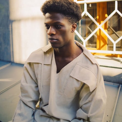 D01–01 Dual Pocket Structured Oversized Top