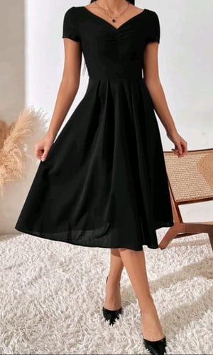 فستان نسائي أسود جيب 7 و زم خفيف