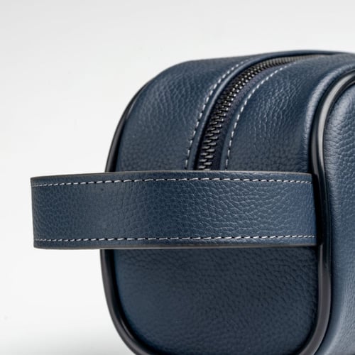 محفطة يد لون كحلي