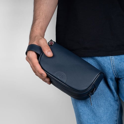 محفطة يد لون كحلي