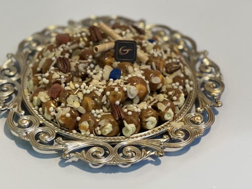 صينيه كيلو حول60حبة سكري مكشوف محشي دايجستف باللوز...