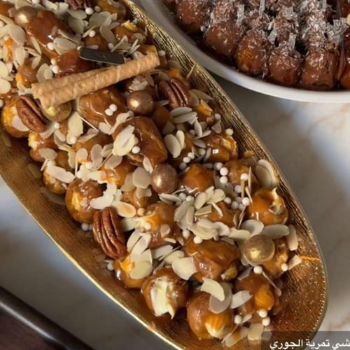 صينيه كيلو حول60حبة سكري مكشوف محشي دايجستف باللوز...