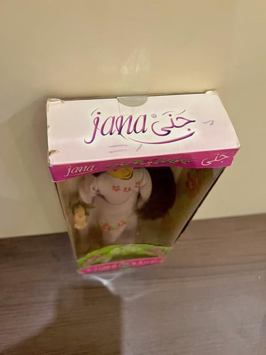 نادر جدا/دمية جَنَى من طيور الجنة اصدار2009+سي دي...