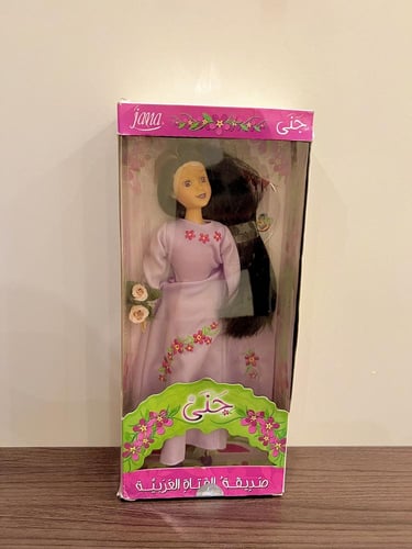 نادر جدا/دمية جَنَى من طيور الجنة اصدار2009+سي دي...