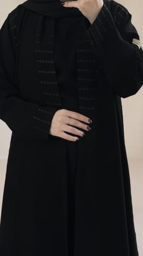 كريب ملكي سواد فاحم نص كلوش بكسره وتطريز