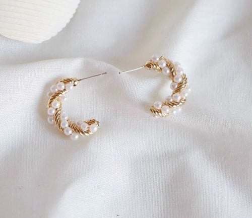 حلق دائري مطلي بالروديوم و قطع اللولو