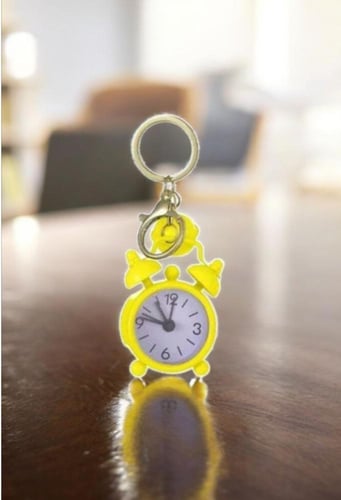 تعليقة شنط ساعه منبه