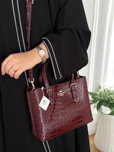 شنطة كوتش مولي