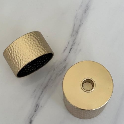 حامل شمع معدن ذهبي