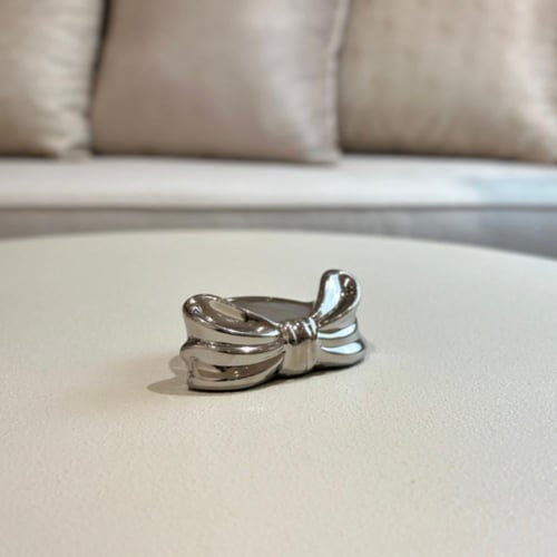 حامل شمع سيراميك فضي