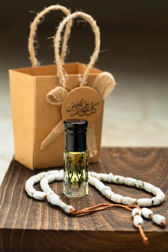 توزيعات العيد زيت عطري ربع تولة لون أسود وسبحة