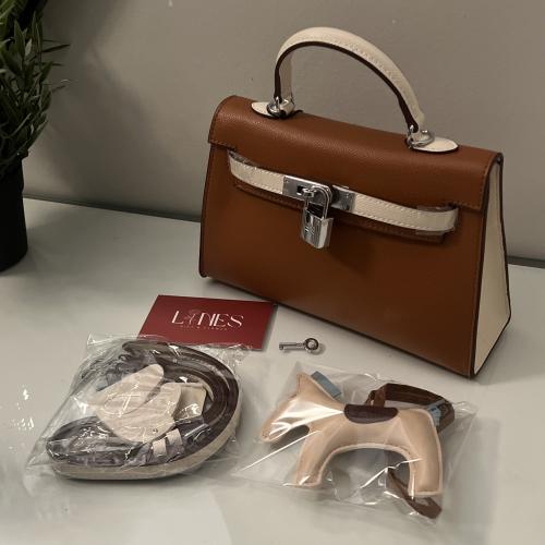 شنطة كايلي جملي وبيج