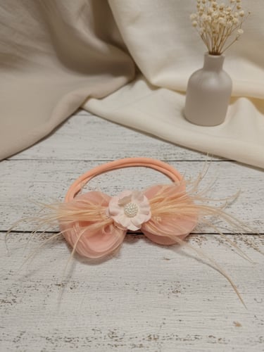 ربطة بيبي قماشية بالريش