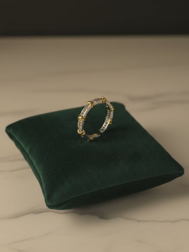 خاتم بتصميم " X " ذهبي وفضي