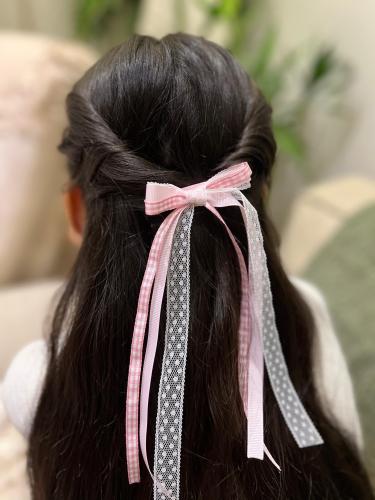 بنسة على شكل فيونكة بألوان متعددة