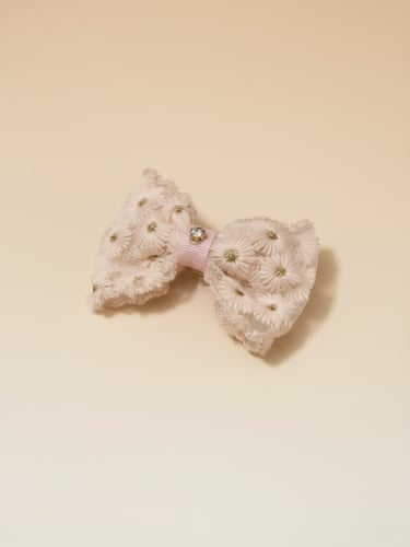 زوج من مشبك الشعر على شكل فيونكة