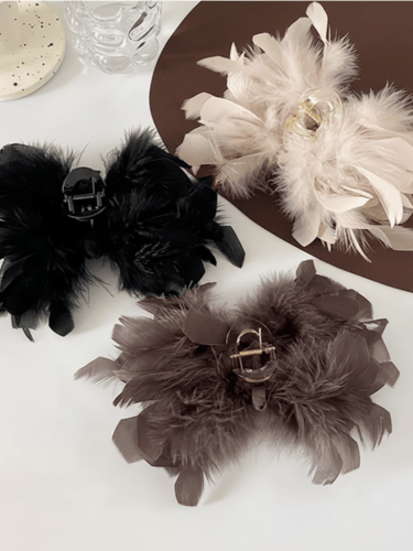 مساكة شعر من الريش حجم كبير