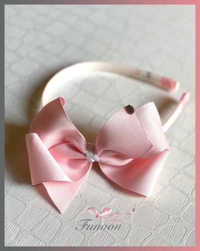 أطواق مدرسية بشكل فيونكة متعددة الألوان