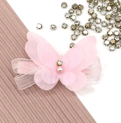 بنسة بشكل فراشة بألوان متعددة