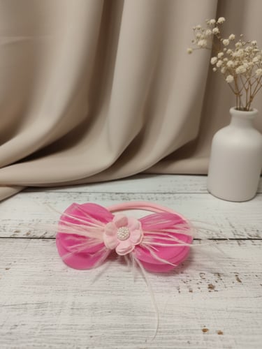 ربطة بيبي قماشية بالريش