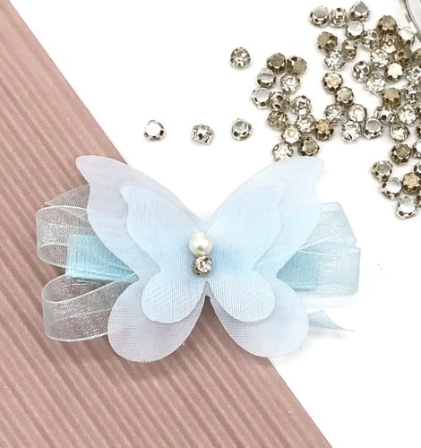 بنسة بشكل فراشة بألوان متعددة