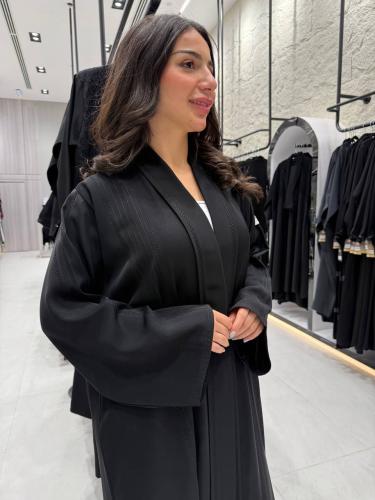 عباية قماش كريب بتطريز ناعم وقصة ربع كلوش - أناقة...