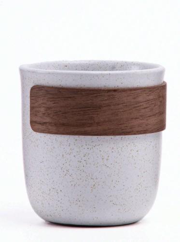 A cup of coffee with a heat-resistant handle