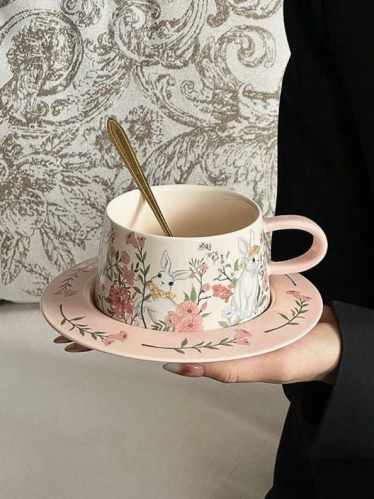 A set of coffee cups and saucers in the shape of a rabbit