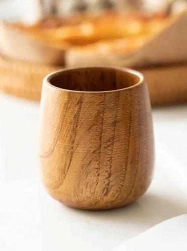 An old-style wooden coffee cup with a capacity of 150 ml