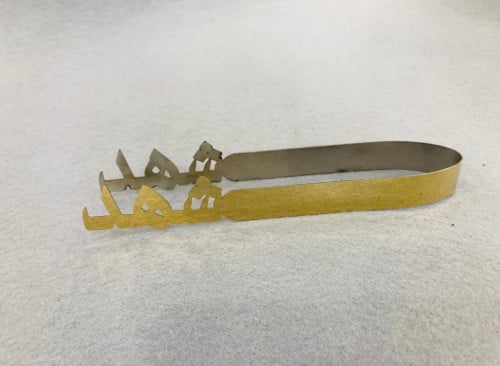 ملقاط شهد . ستيل ذهبي