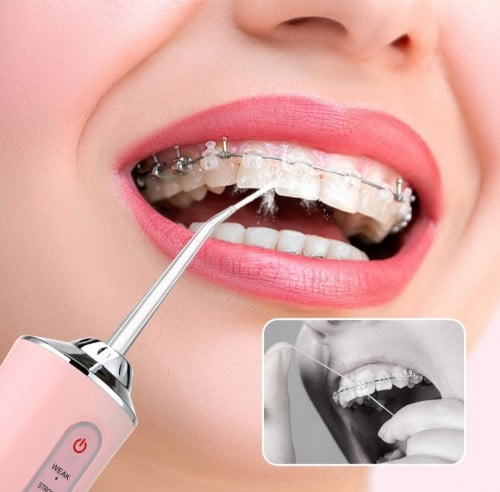 جهاز تنظيف الأسنان بالماء