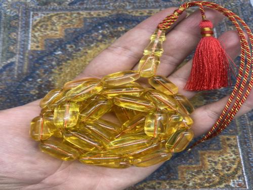 كهرمان بلطيقي شفاف ٤٩ خرزه ٥٥ جرام ٩-١٩