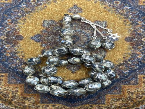 صدف بحري طبيعي ملبس بلفضه ٣٣ خرزه١١ ملي