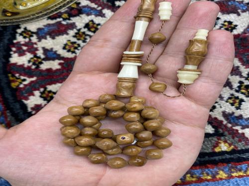 كوك وعظم نعام ٤٥ خرزه ٨ ملي مقاس متفاوت بسيط