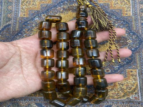 كهرمان شوائبي شفاف ٦٣ جرام ٣٣ خرزه ١٢-١٥ ملي