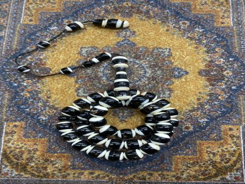 يسر وعاج ٣٩ خرزه ٩ ملي