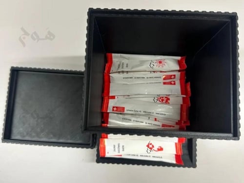 موزع أظرف السكر