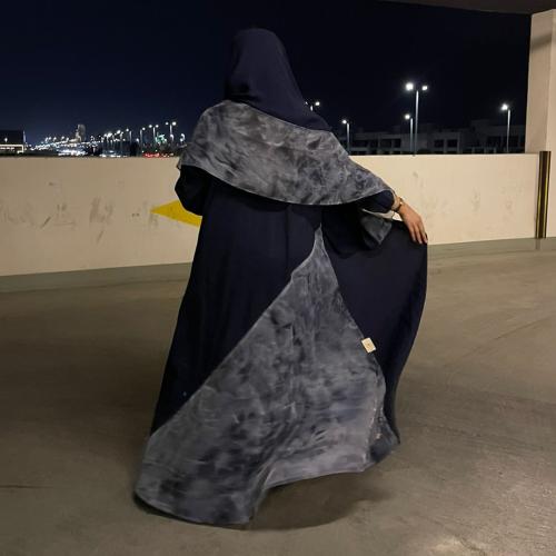 Silk abaya washed navy blue with an addition from behind and in the hijab, organza fabric with floral pattern