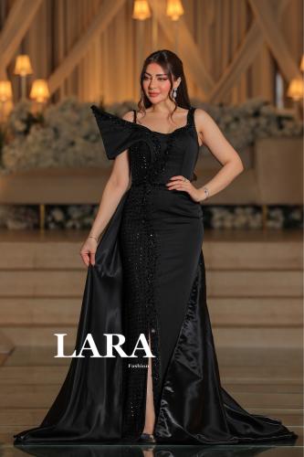 "فستان اسود فاخر بلمسات ترتر فخمة وتصميم مميز على...