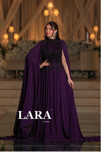 فستان يجمع بين الفخامة والكلاسيكية، بتصميم كاب فاخ...