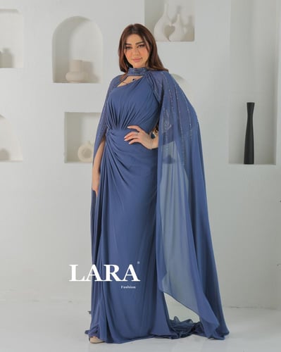 فستان سهرة مرصع بالفصوص اللماعة