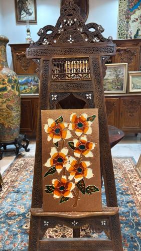 لوحة فنية يدوية على الخشب المغلّف بالنحاس